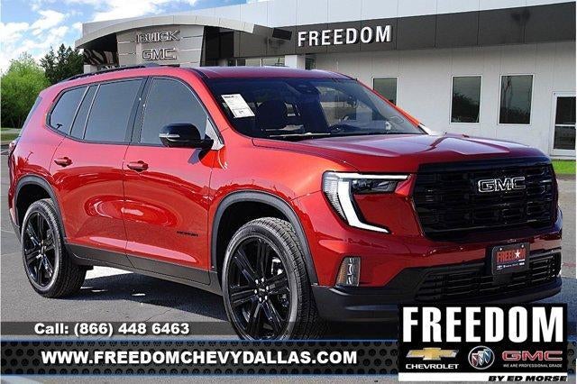 2026 GMC Acadia Elevation in Volcanic Red Tintcoat — front three-quarter view