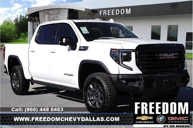 2026 GMC Sierra 1500 AT4X in Summit White — front three-quarter view