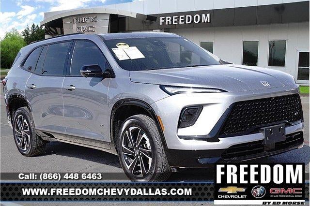 2026 Buick Enclave Sport Touring in Moonstone Gray Metallic — front three-quarter view